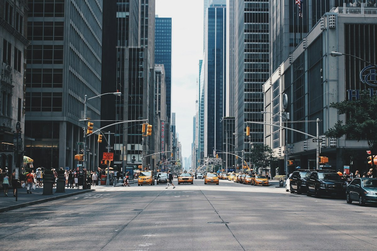 City street lined with tall buildings